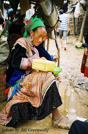 Pouring rice wine, Cocly market, Vietnam